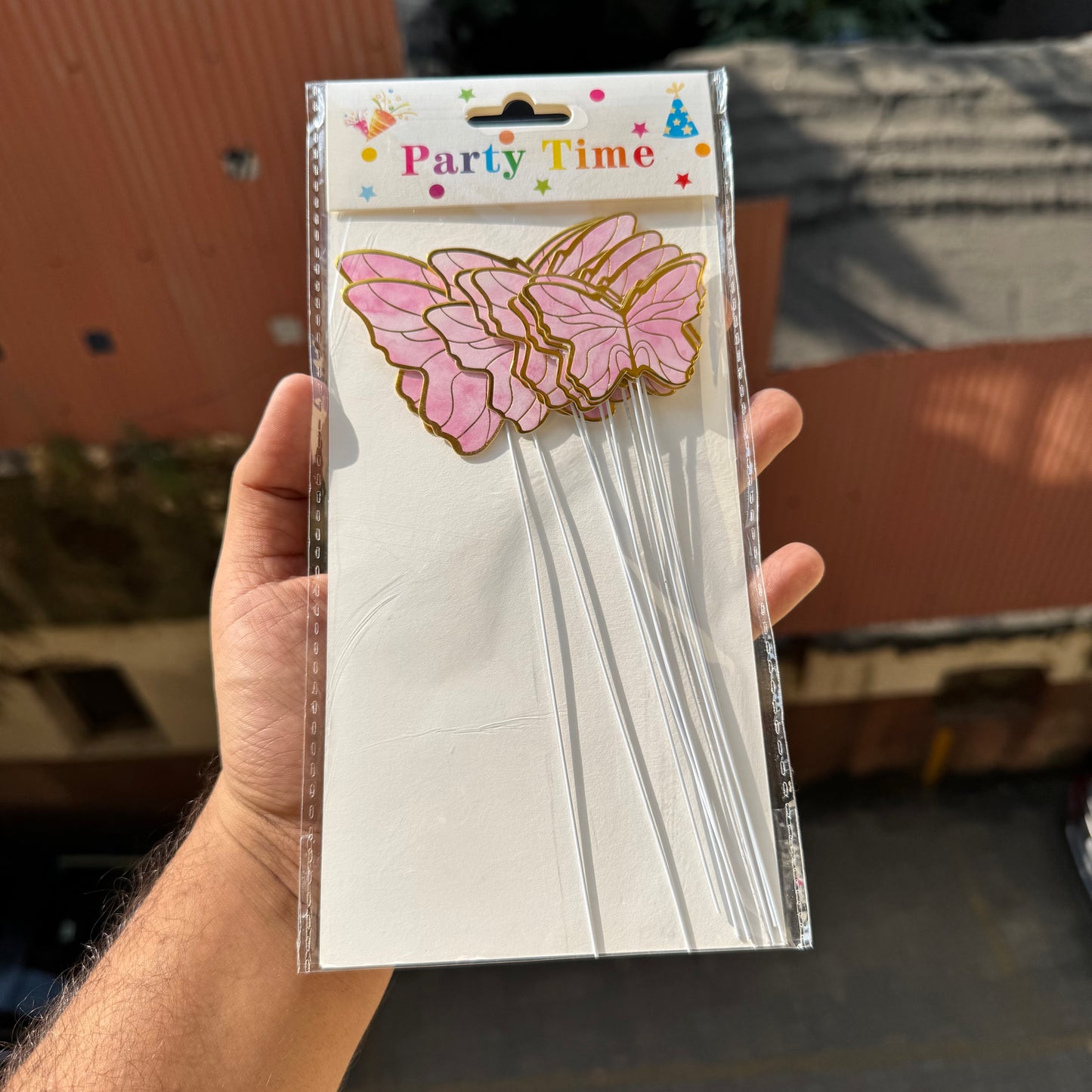Pink Butterfly With String