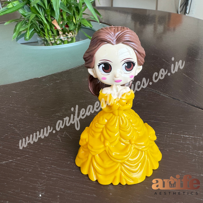 Yellow Bella Doll Toy Topper – - Main Image