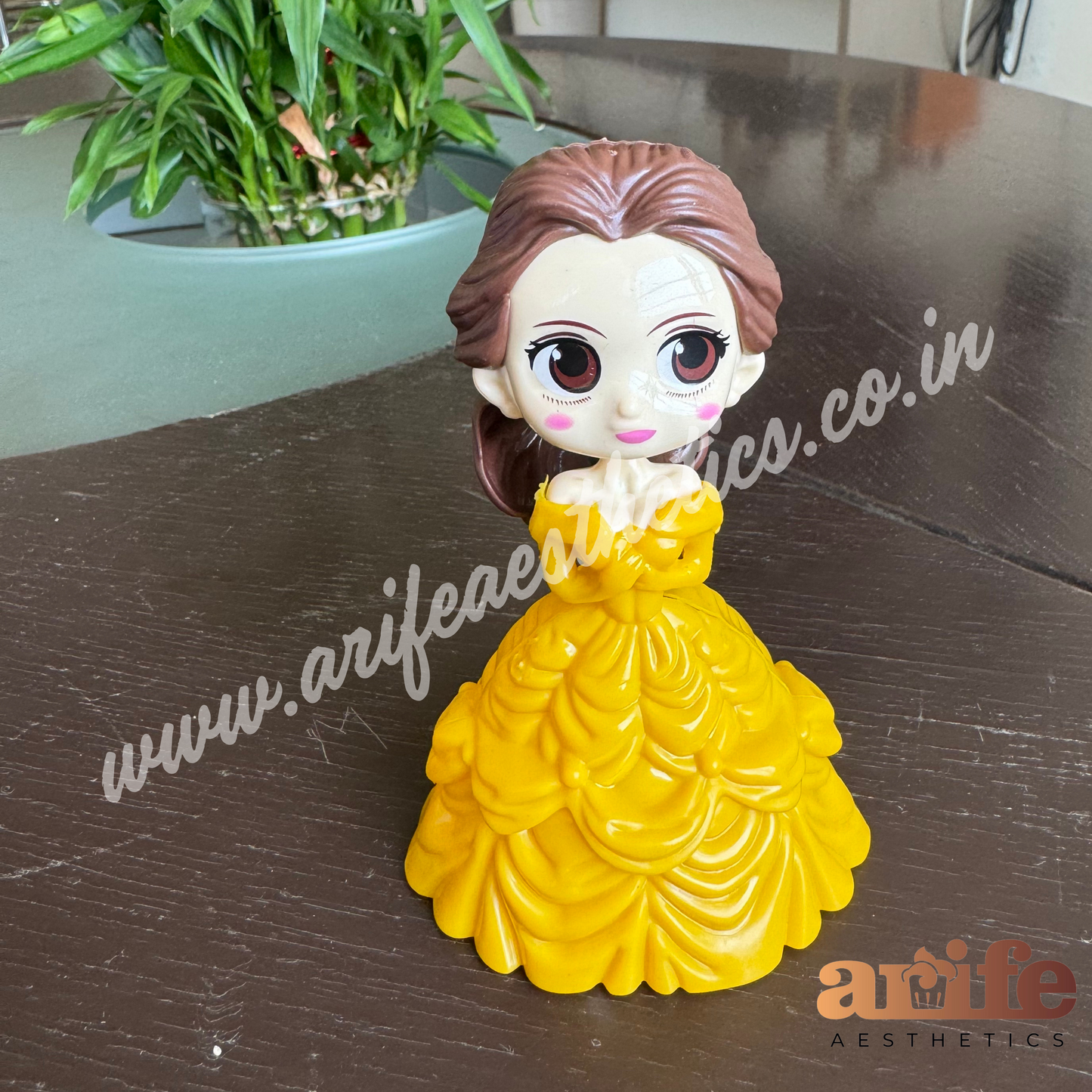 Yellow Bella Doll Toy Topper